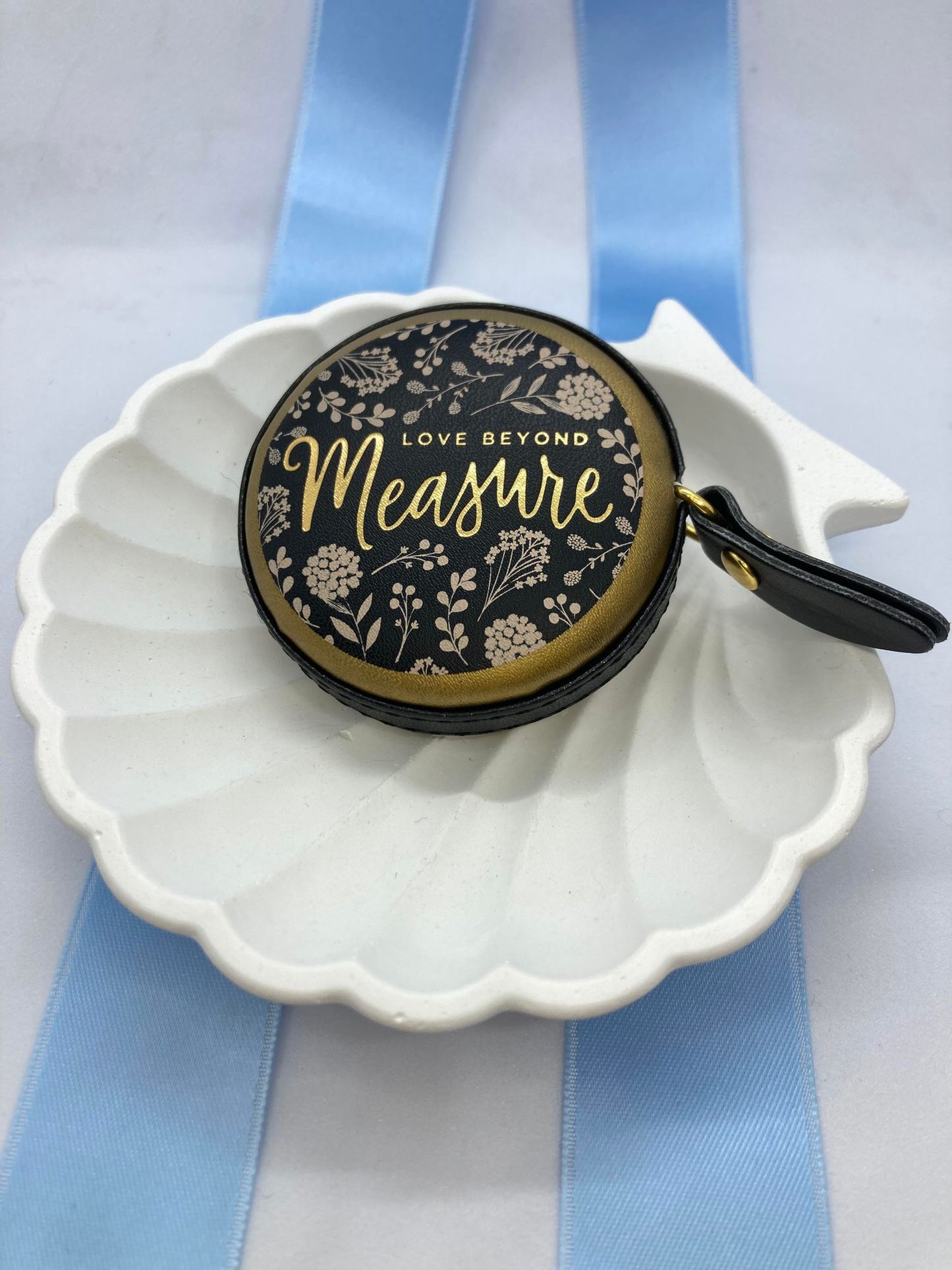 Svart og gull målebånd