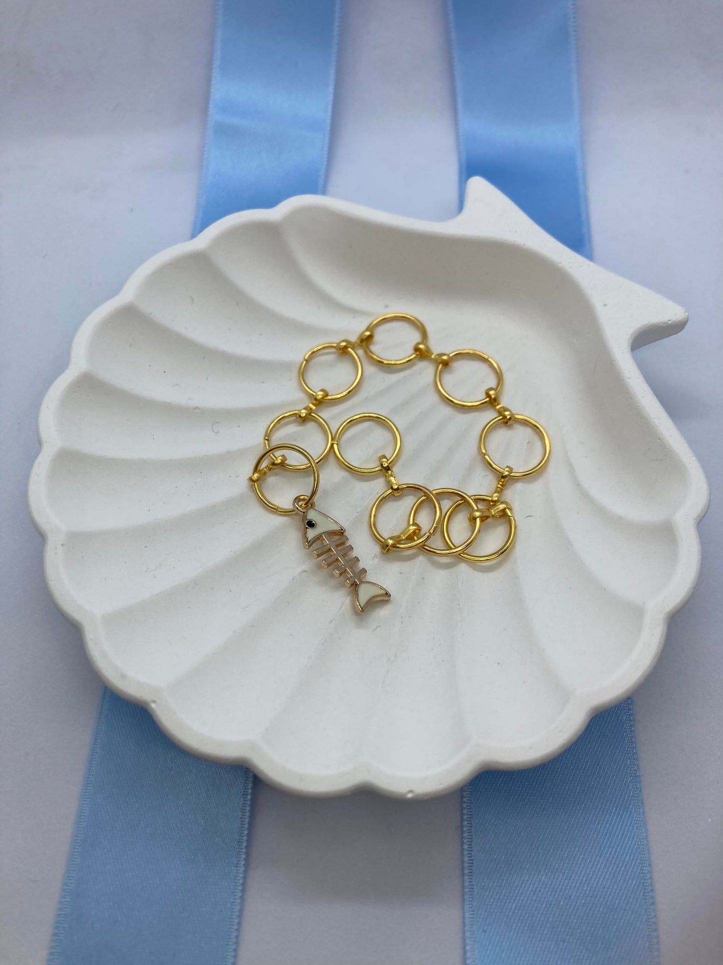 Strikkefisk sølv og gull